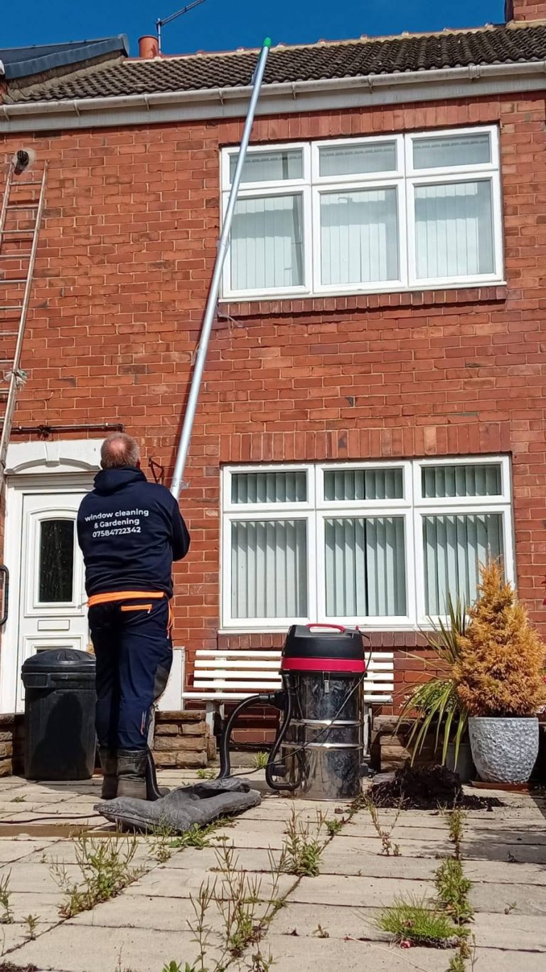 Clearing gutters with a gutter vacuum pole